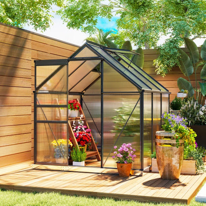 Outsunny greenhouse with plants on a wooden deck in a garden setting