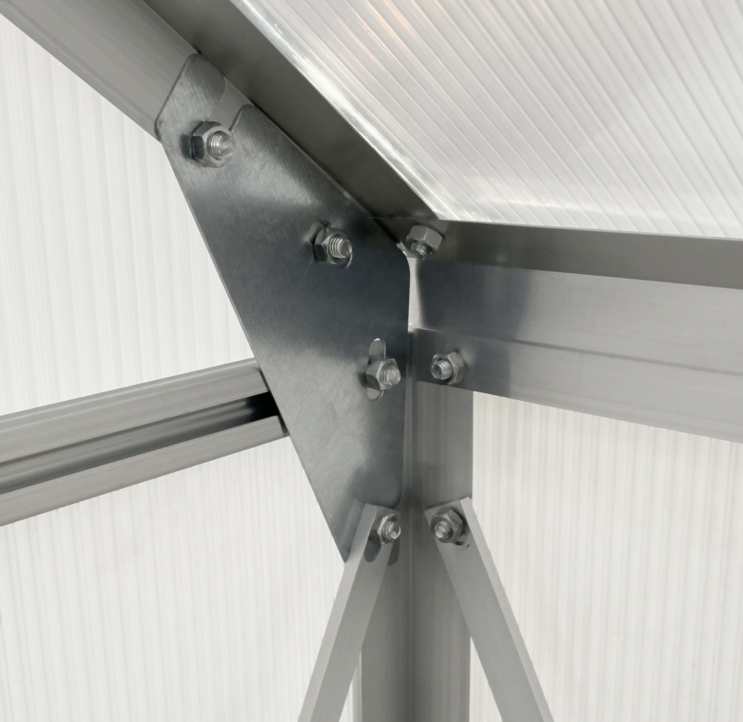 Close-up of a metal frame with screws