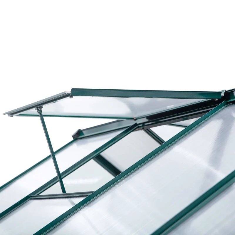 Glass table with green metal frame on a white background