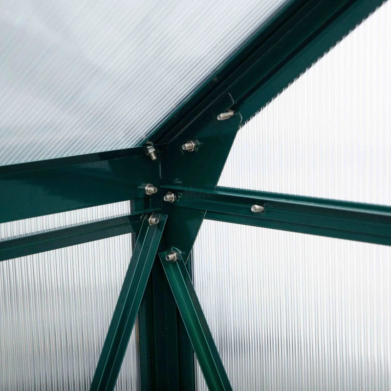 Close-up of a green metal frame with screws against a white background