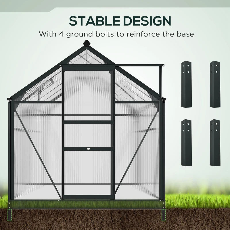Black metal greenhouse with ground bolts on a grassy background