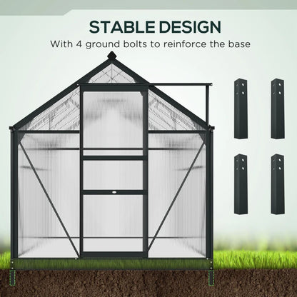 Black metal greenhouse with ground bolts on a grassy background