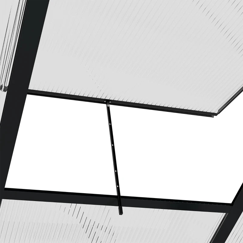 Close-up of a skylight with black frame and white glass panels.