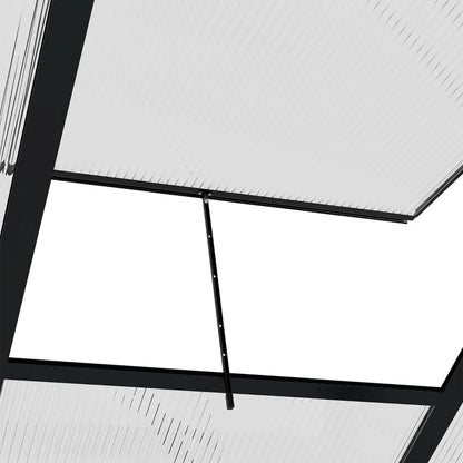 Close-up of a skylight with black frame and white glass panels.