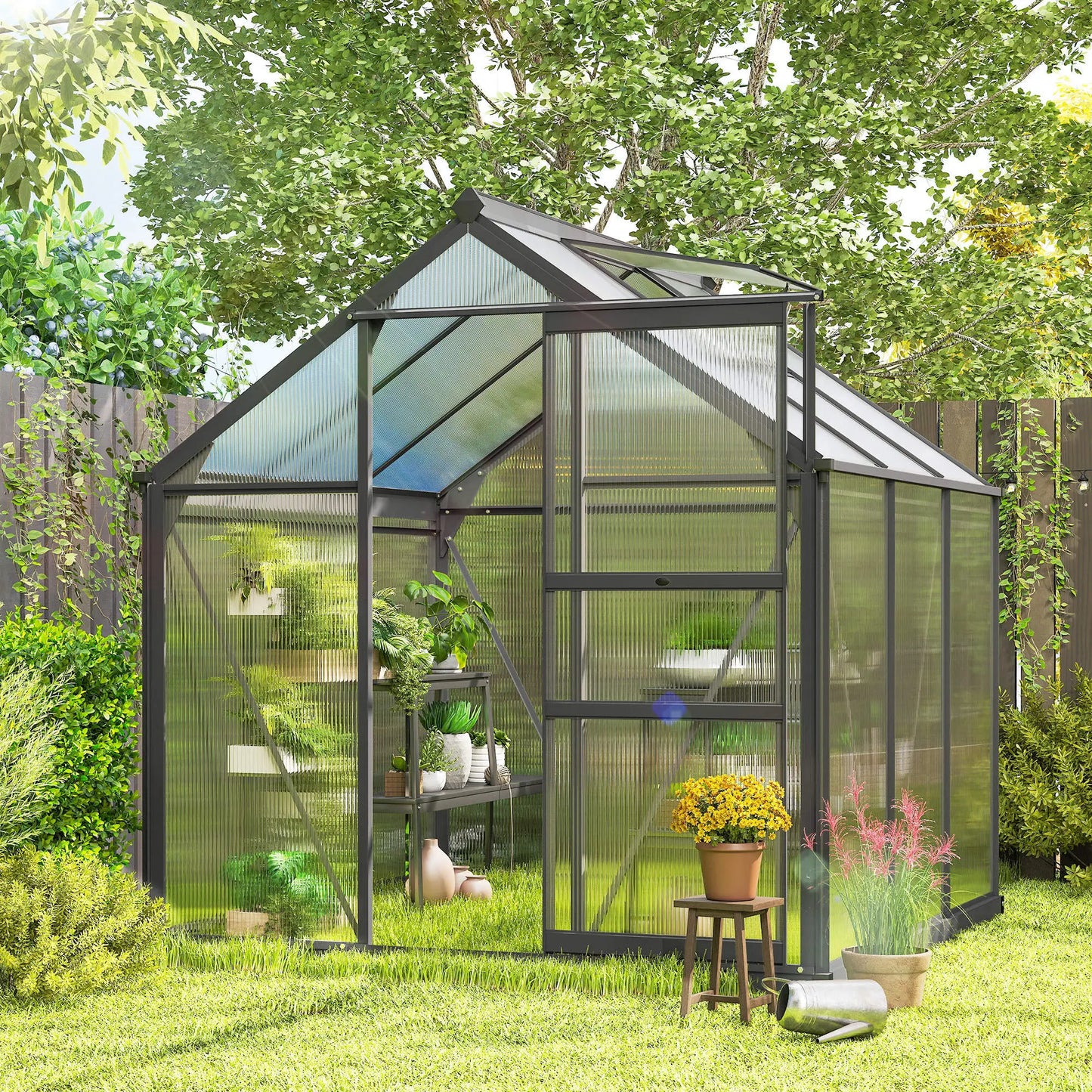 Greenhouse with plants and gardening tools in a garden setting