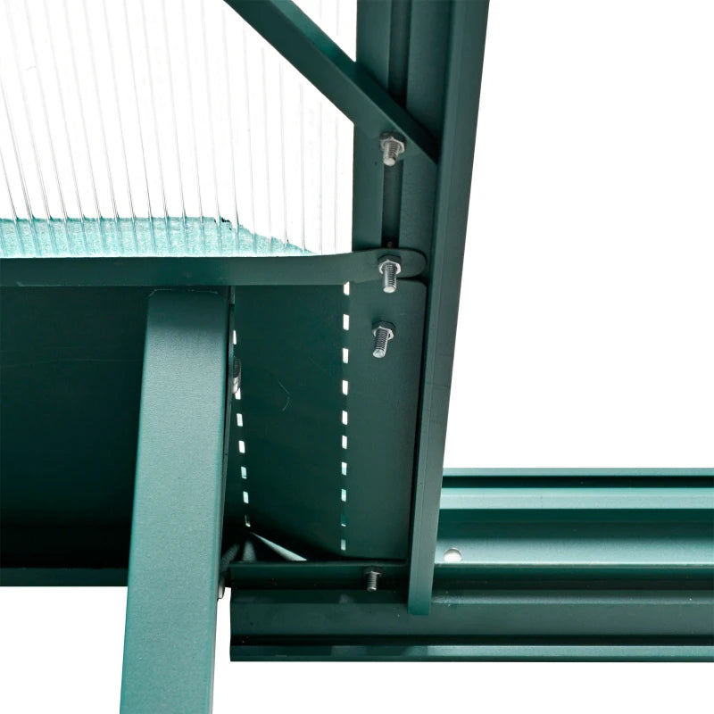 Close-up of a green metal shelving unit with visible brackets and screws.