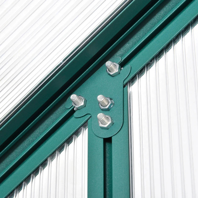 Close-up of a green metal frame with screws on a white background