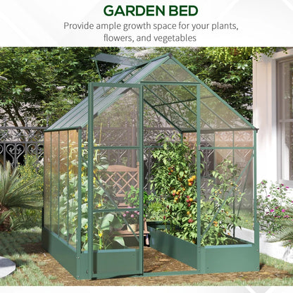 Green garden bed with glass panels in a garden setting