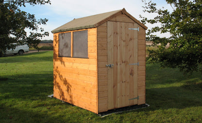 EcoBase Fastfit Shed Base Kit showing assembled base with gravel and frame for secure garden shed foundation.