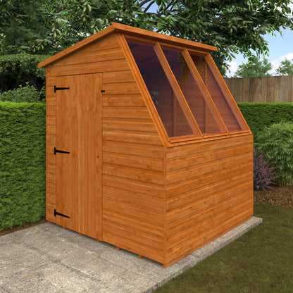 Wooden Norven Classic Potting Shed by Norven Gardens, 6x6 size, featuring a sturdy wooden structure and a glass-paneled door.